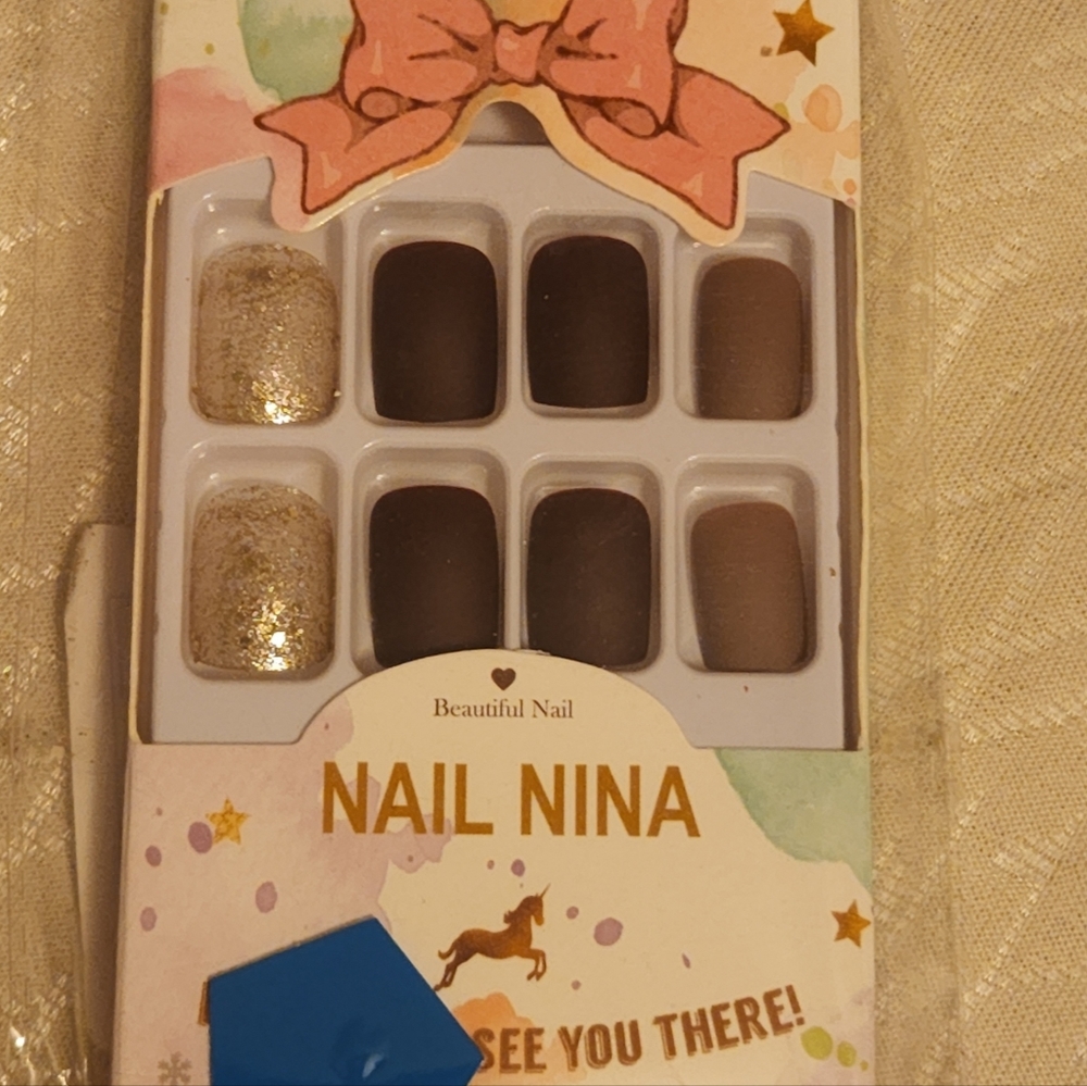NIP Nail Nina press-on nails with a filer
